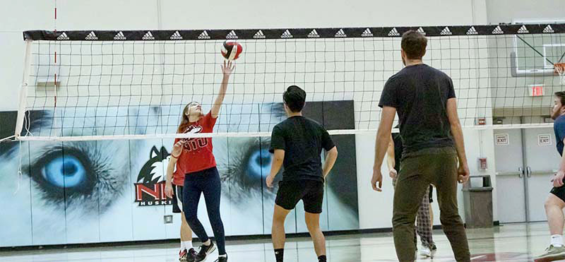 Students playing intramural volleyball